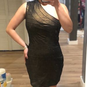 Express shimmering gold off shoulder dress